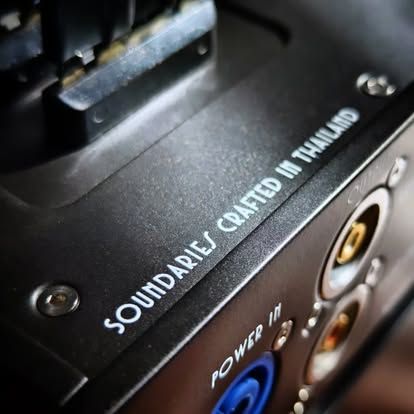 Engraved 'Soundaries crafted in Thailand' on an amplifier chassis
